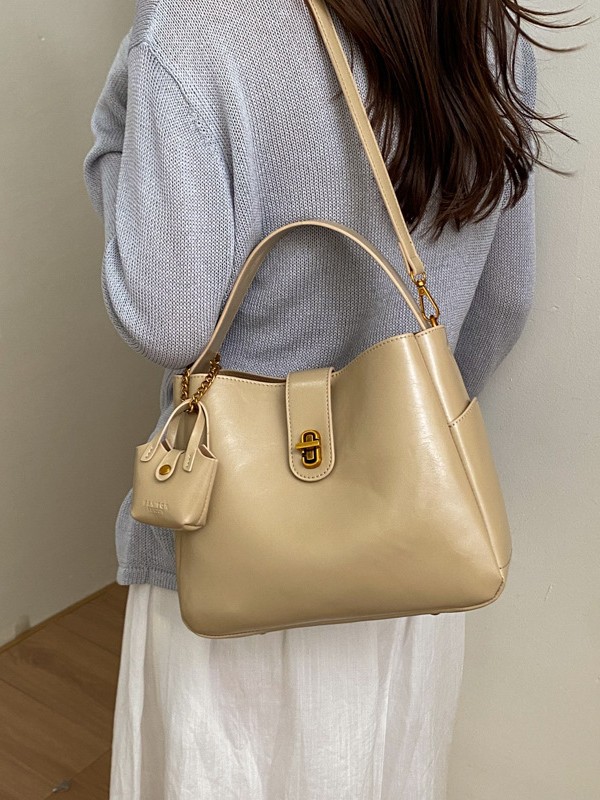 Bolsa portátil de cuero de cera retrógrada para mujeres 2026 nueva sensación de lujo ligera de alta calidad de moda versátil mochila de hombro
