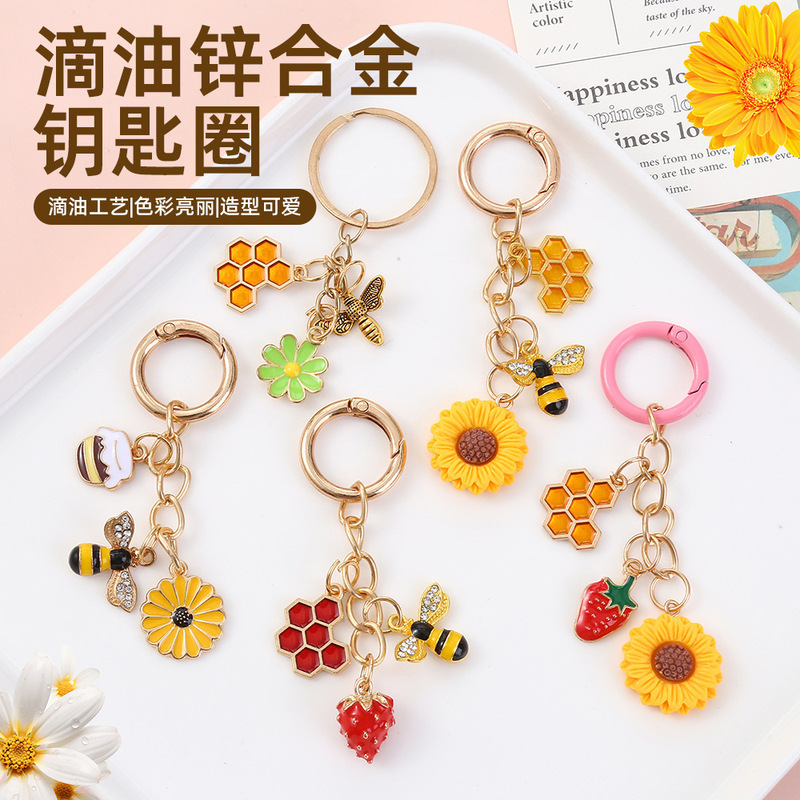 Cross-Border Hot-Selling Small Pendant Pearl Bee Honeycomb Sunflower Versatile Pendant Creative Fashion Small Gift Keychain Cross-Border Hot-Selling Small Pendant Pearl Bee Honeycomb Sunflower Versatile Pendant Creative Fashion Small Gift Keychain