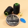 2 rolls of black thread + black plate needle + thumb + thimble