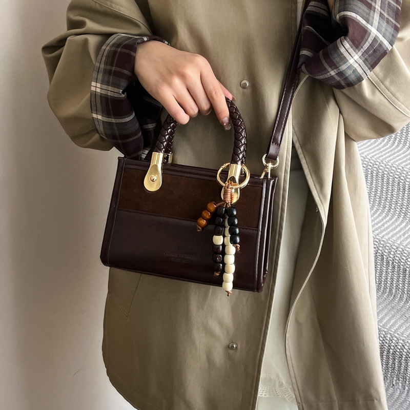 Niche Zhong Leopard Pattern retro bolso de mano mujer otoño / invierno 2025 nuevo estilo de alta calidad de viaje de hombro mochila