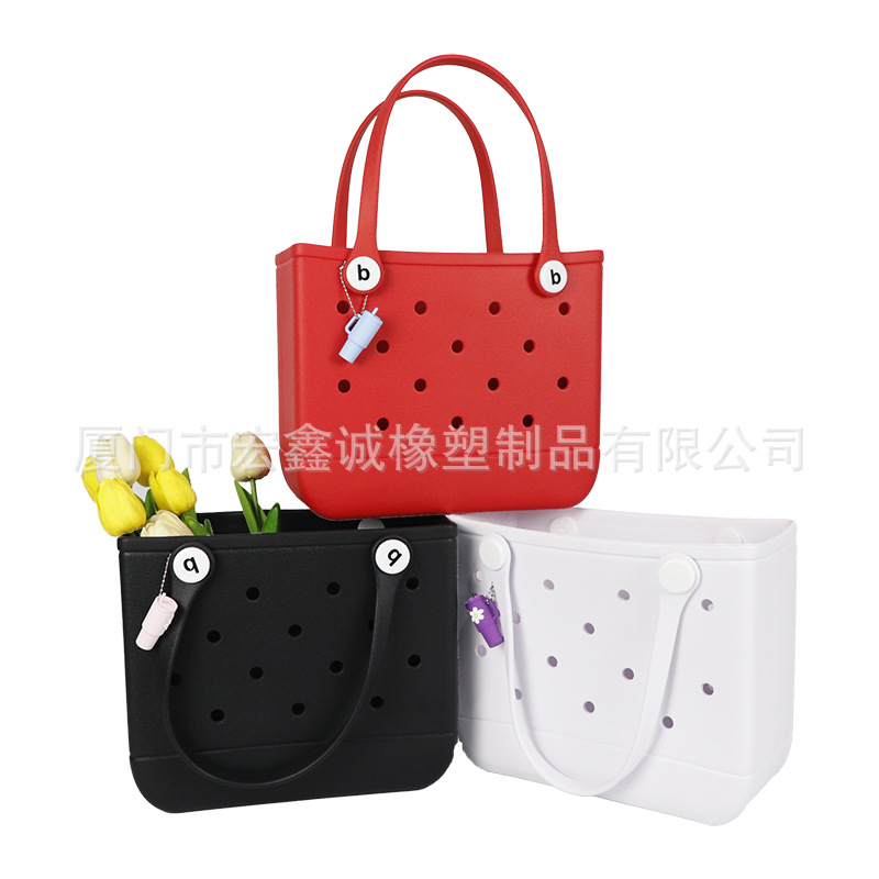 Venta caliente transfronteriza europea y americana nueva pequeña de gran capacidad impermeable linda niña niño EVA agujero agujero bolsa eva playa bolsa