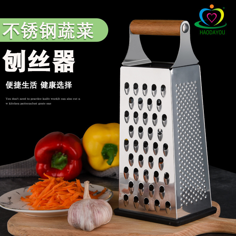 木の柄の野菜のおろし器の多機能の4面の野菜切り器のジャガイモの大根のおろし器の台所のステンレスのおろし器|undefined