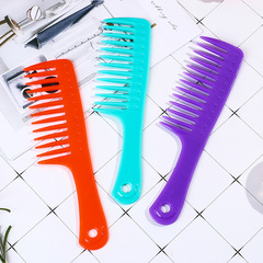 Large, wide-toothed comb with big teeth—perfect for curling and styling long hair; a popular online choice, made from durable resin plastic that prevents tangling and makes combing effortless.