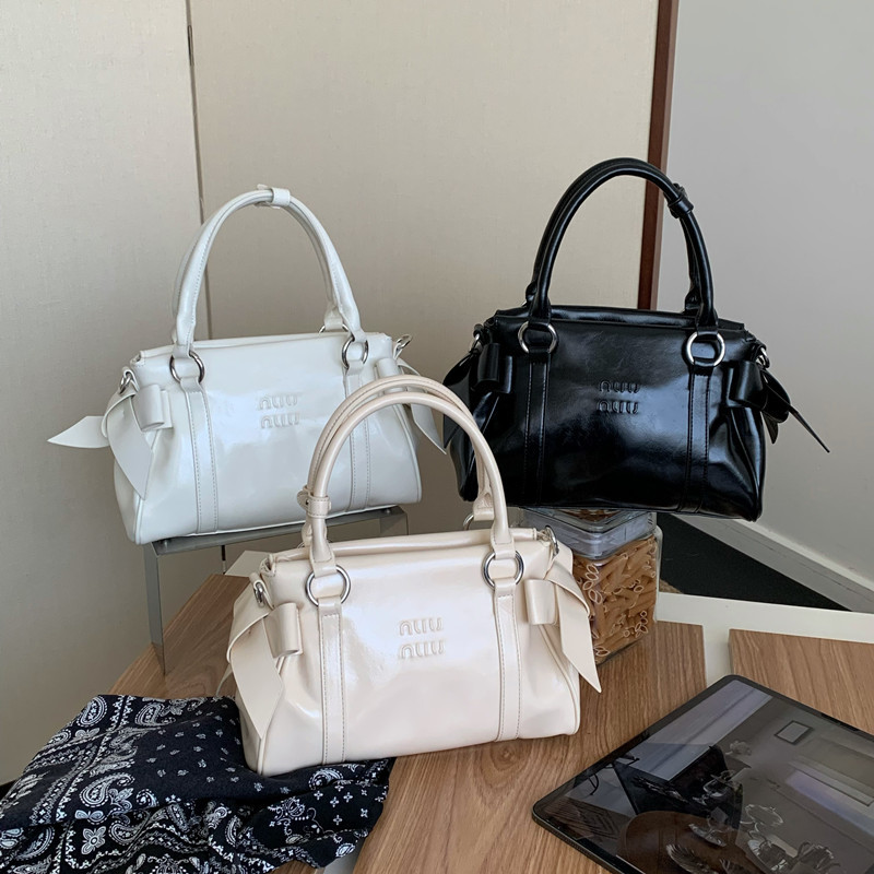 小众设计复古辣妹机车包2026早春新款蝴蝶结手提包通勤单肩斜挎包