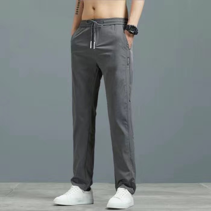 2025 nuevos pantalones delgados para hombres pantalones casuales delgados para hombres pantalones de primavera y otoño de moda para hombres pantalones de color sólido