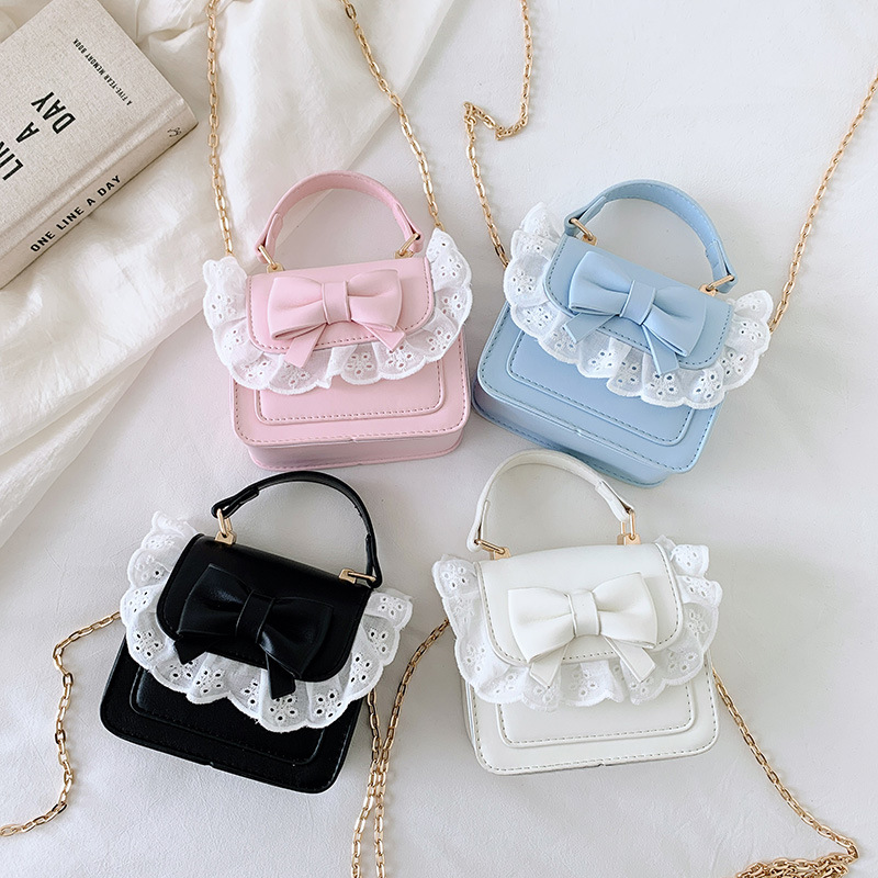 Bolsos de hombro de encaje extranjero para hombres y mujeres, bolsas de cadena de arco mini lindas coreanas nuevas bolsas para niños