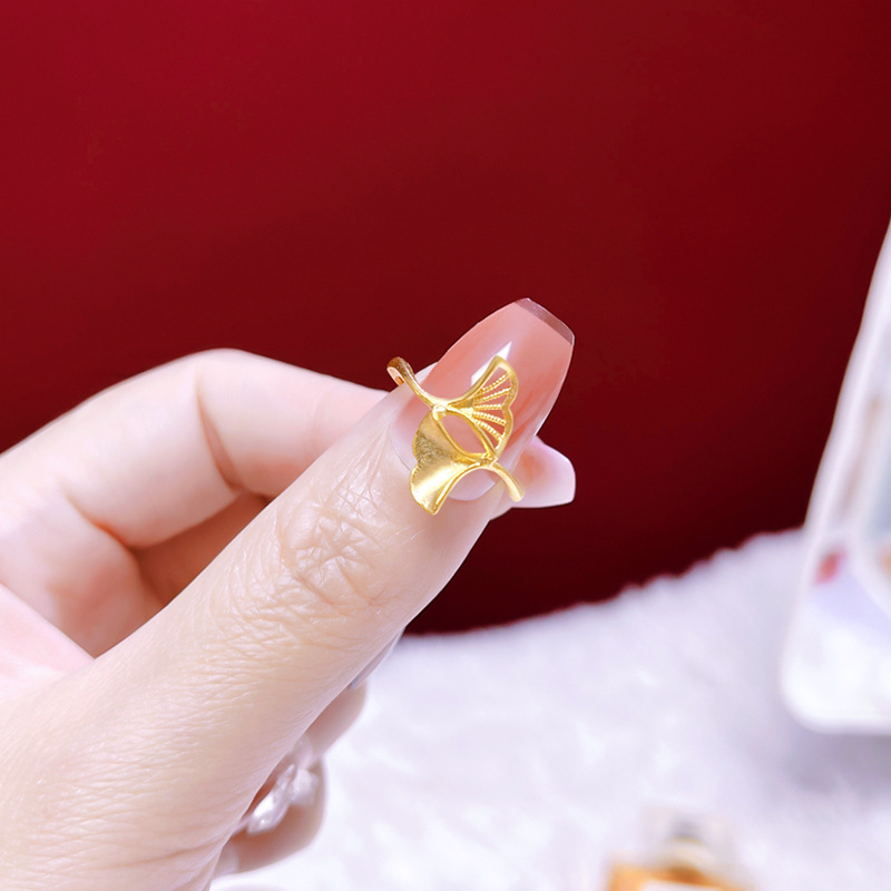 Nuevo anillo de oro de vietnam hoja de ginkgo femenina flor de cuatro hojas hueco ajustable anillo de oro de imitación todo fósforo joyería de estilo nacional