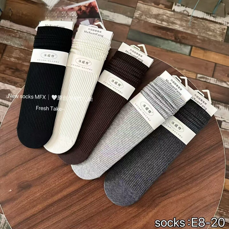 Women's striped, ruffled, seamless mid-calf socks, available in multiple colors, soft and comfortable, sourced from a physical store