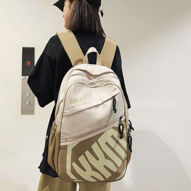 Mochila escolar 2025 nueva marca de moda para estudiantes universitarios Mochila de viaje por computadora de gran capacidad para estudiantes de secundaria y preparatoria