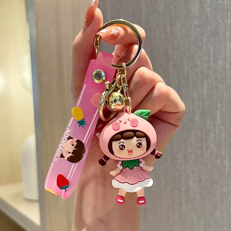 Chica de fruta de dibujos animados creativos bolsas de llaves para automóviles pequeños colgantes de moda regalos al por mayor