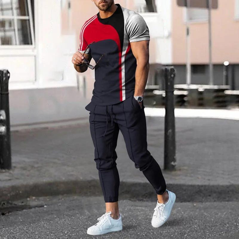 男性のスーツの夏の青年の半袖のtシャツのストライプは色のゆったりした弾力の薄い運動のズボンの2つのセットをつづり合わせます。|undefined