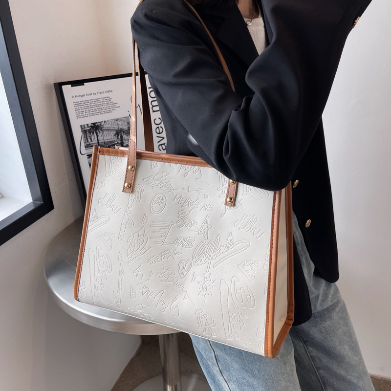 Bolsa de gran capacidad para mujeres otoño / invierno 2022 nueva moda de moda simple atmósfera bolsa de viaje de hombro japonesa bolsa especial