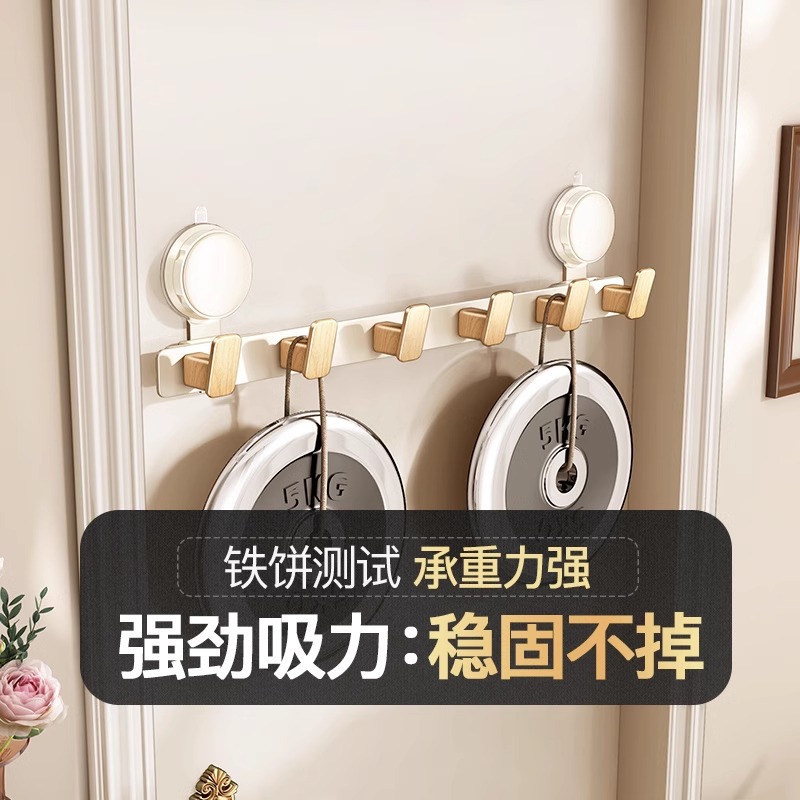 Gancho de ventosa detrás de la puerta una fila de agujeros sin perforación fuerte portante de carga en el área de percha de ropa colgada por el portal en la puerta de entrada de almacenamiento de estantes