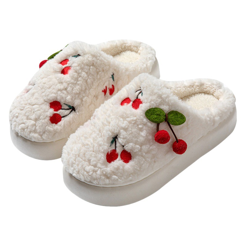 厚い底のさくらんぼの綿のスリッパの女性の秋冬のベルベットの超厚い保温の家庭用学生は糞感の綿のスリッパを踏んで卸売りします。