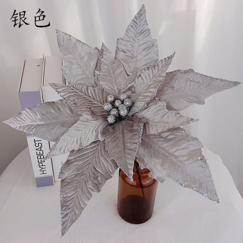 粉を撒いた綿布は紅葉の花の家庭装飾の結婚祝いの道具の金粉の綿布の花をシミュレーションしてシミュレーションの花の道具を撮影します。|undefined