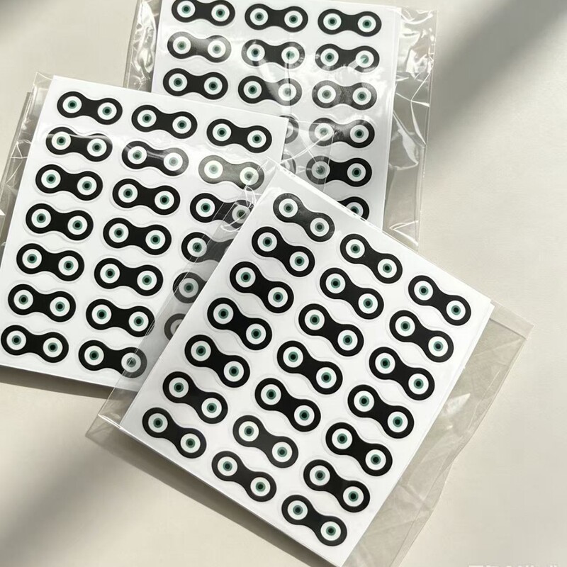 New waterproof egg-shaped PVC material egg black eye stickers. Cartoon animal eye mask stickers for mobile phones and gifts