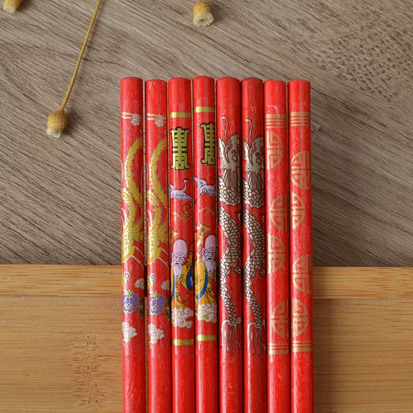 Factory wholesale dragon and phoenix chopsticks red wedding chopsticks dance props red chopsticks single and double ceramic gift box chopsticks