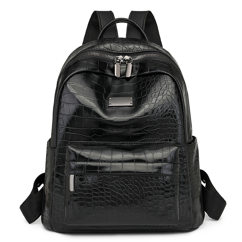 2025 primavera nueva mochila de cuero suave para mujer, mochila de viaje urbano de todo fósforo de moda, mochila escolar para estudiantes universitarios al por mayor