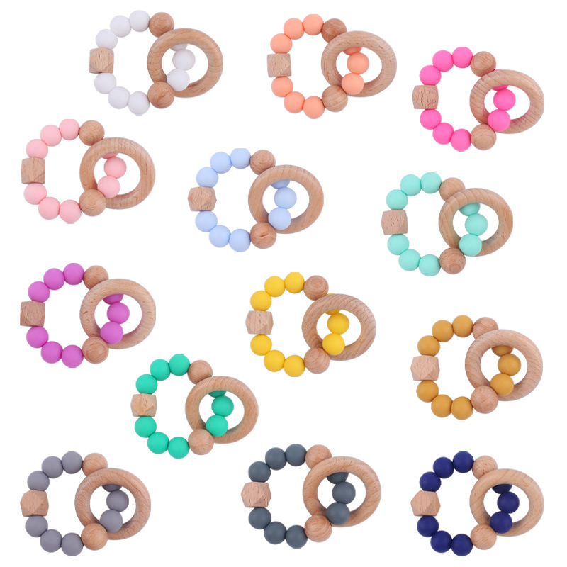 Nuevo bebé suministros de madera de haya anillo mordedor calmante bebé cuentas de silicona mordida molar pulsera mordedor juguete