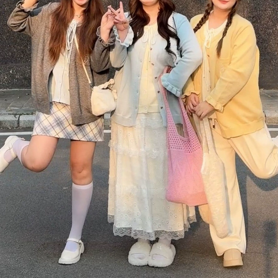 Большой размер женщины с круглым вырезом поддельные два трикотажа женский новый бант свободный ретро кардиган топ