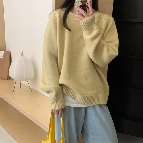 Stylish women's oversized cozy winter round neck simple solid color Korean style knit top for a loose and slimming fit