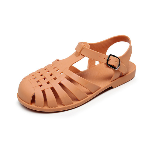 Baotou sandals for women, summer flat-bottomed hollow hole shoes, non-slip beach jelly shoes, plastic Roman sandals.