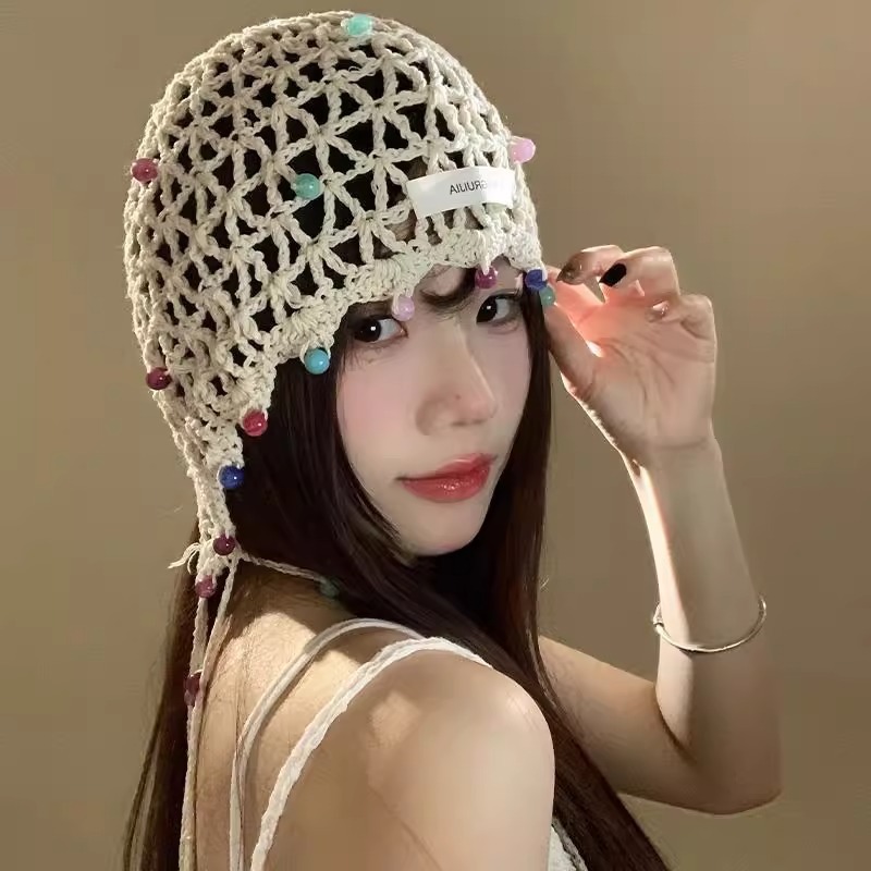 女性用の春夏の手織り中空つば帽子、エスニックスタイルのフックフラワー、タッセルストラップ、プルオーバーニット帽、多用途|undefined