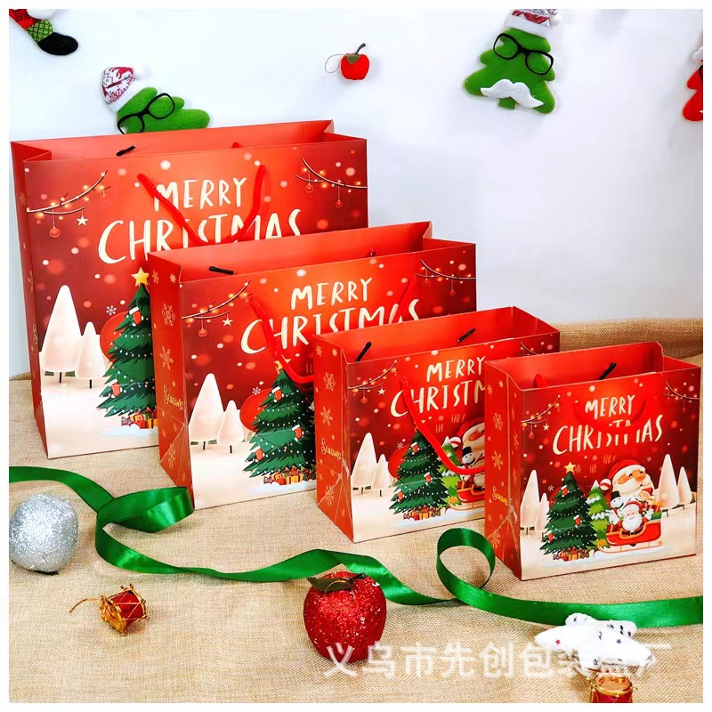 Nueva bolsa de regalo de Navidad bolso bolsa de papel al por mayor bolsa de regalo Portátil Bolsa de embalaje de dibujos animados