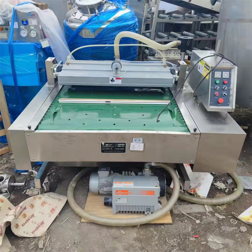 二手1000大型连续滚动式鸭蛋真空包装机 全自动糯玉米真空包装机