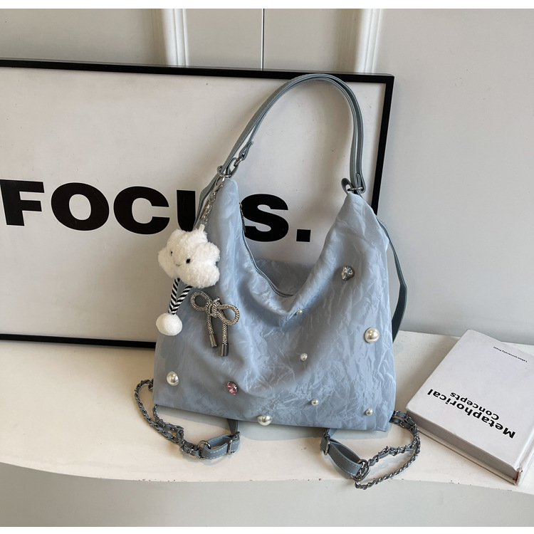 Bolsa de gran capacidad para mujeres 2024 nuevo nicho de alto nivel de diseño de diamantes de viaje multifuncional mochila de doble hombro inclinada