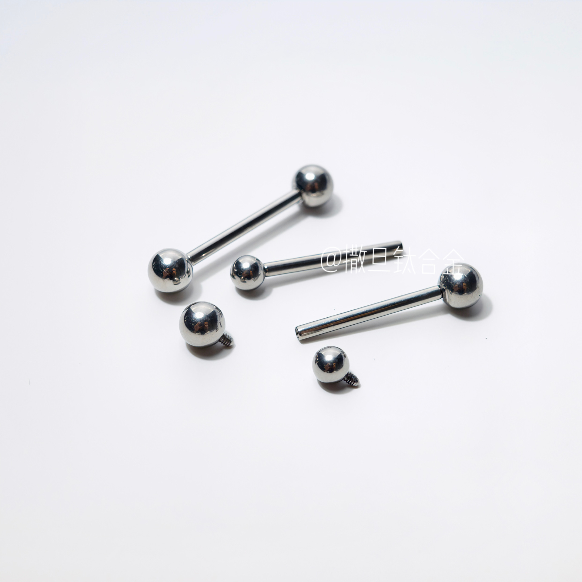 Silver pointed spike labret stud material detail