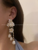 Advanced earrings, silver needle, flowered, light luxury style