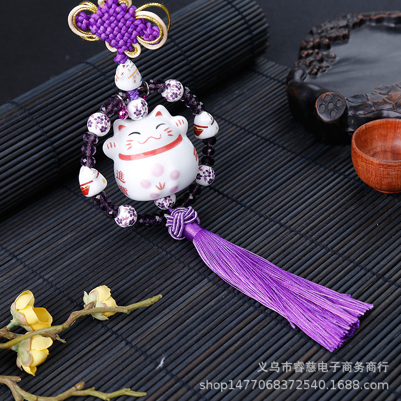 紫色流苏招财猫不带钻.jpg