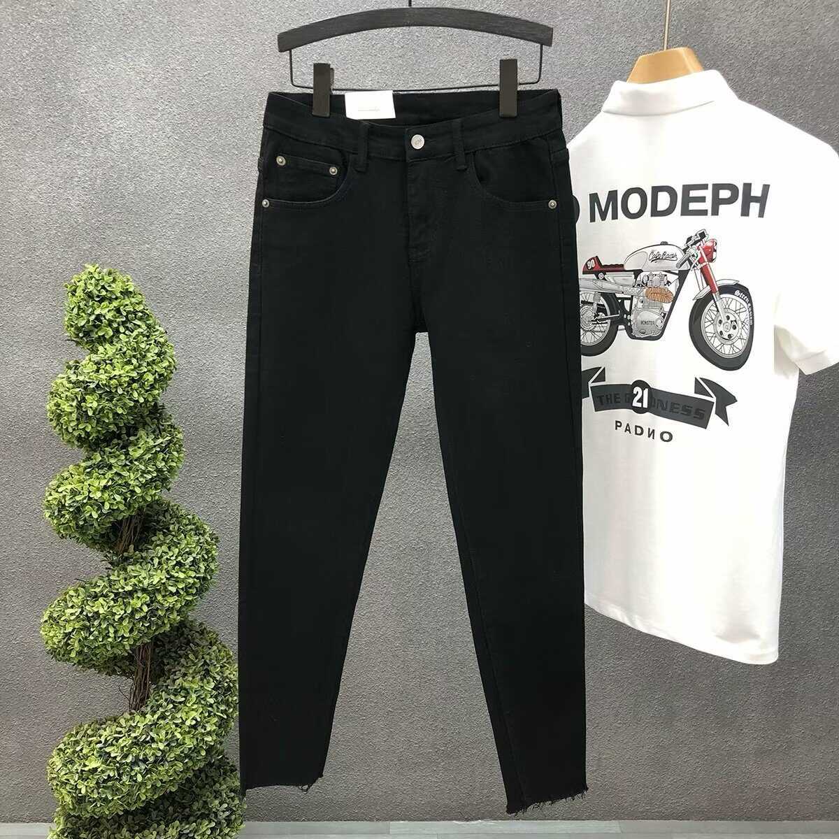Jeans de lana simple para hombres verano nuevo estilo de moda moda para hombres elástico coreano casual delgado pies pequeños nueve pantalones