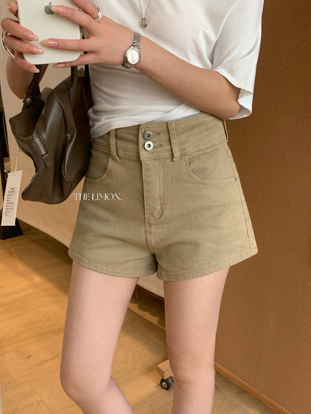Quần short jean nữ lưng cao thiết kế hai khuy, dáng ôm gọn, phối màu cơ bản — màu đen, trắng ngà, màu kaki chi tiết 33