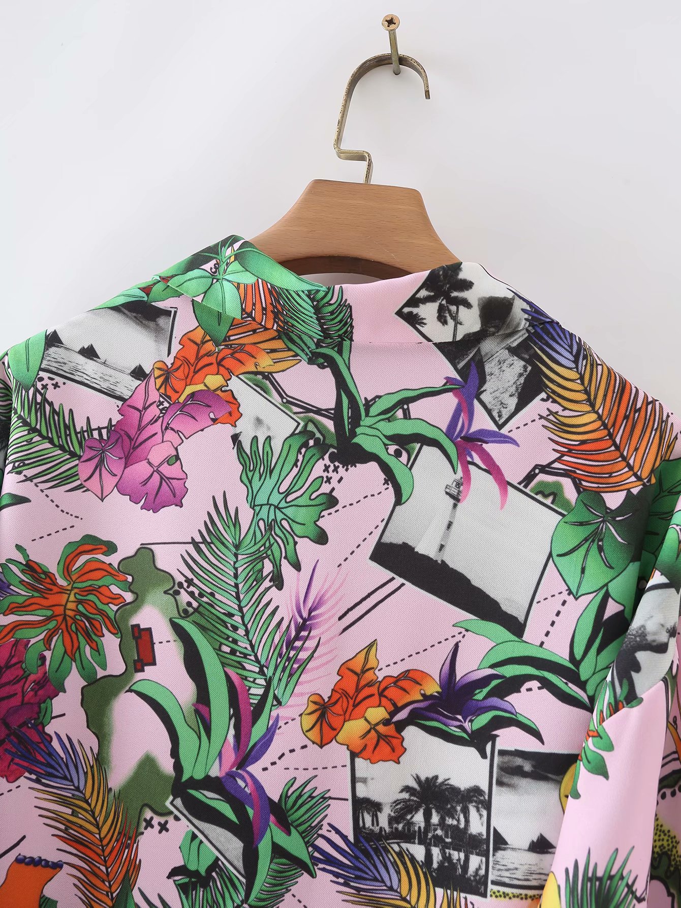 blusa con estampado de estilo tropical de otoño nihaostyles ropa al por mayor NSAM81883