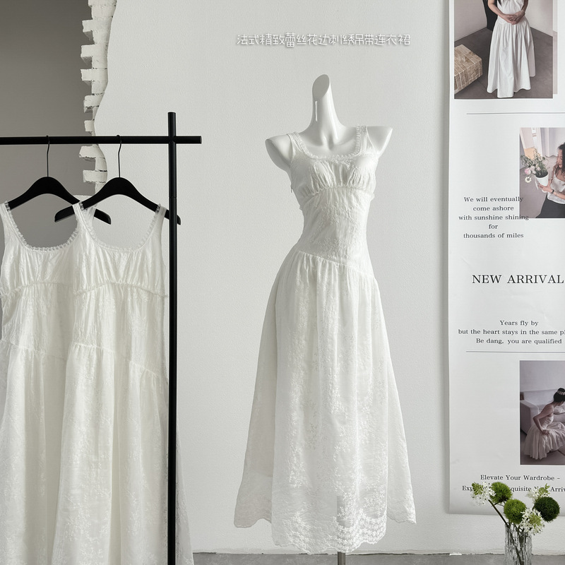 "Xinxing" Pear Blossom Dream: Elegant Lace Vacation Dress with Embroidered Splicing and Straps for Women