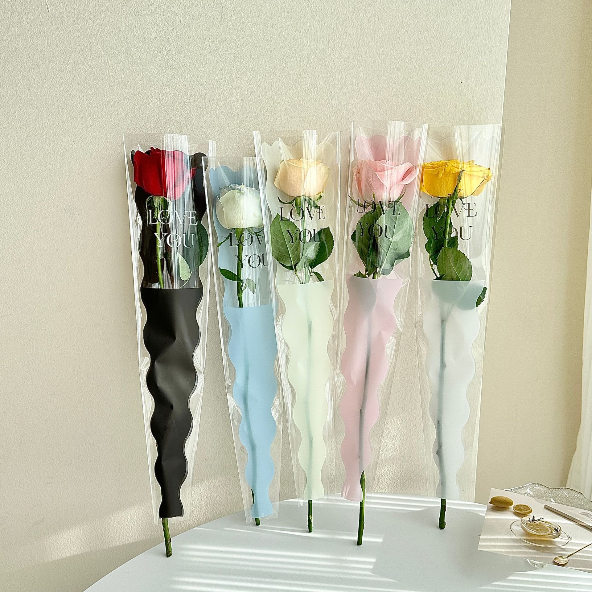 Nueva sirena ondulación del agua sola flor bolsa de embalaje Rosa embalaje OPP escalera bolsa floral material