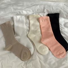 One-piece mechanism boneless seam vertical early autumn cotton socks, solid color simple cream color viral piling socks