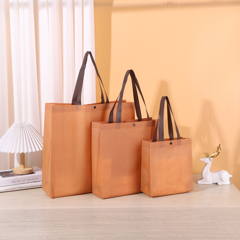 不織布バッグ、既製品、留め具付きハンドバッグ、カラーブロックショッピングバッグ、卸売、印刷入り衣料品包装袋、エコバッグ|undefined