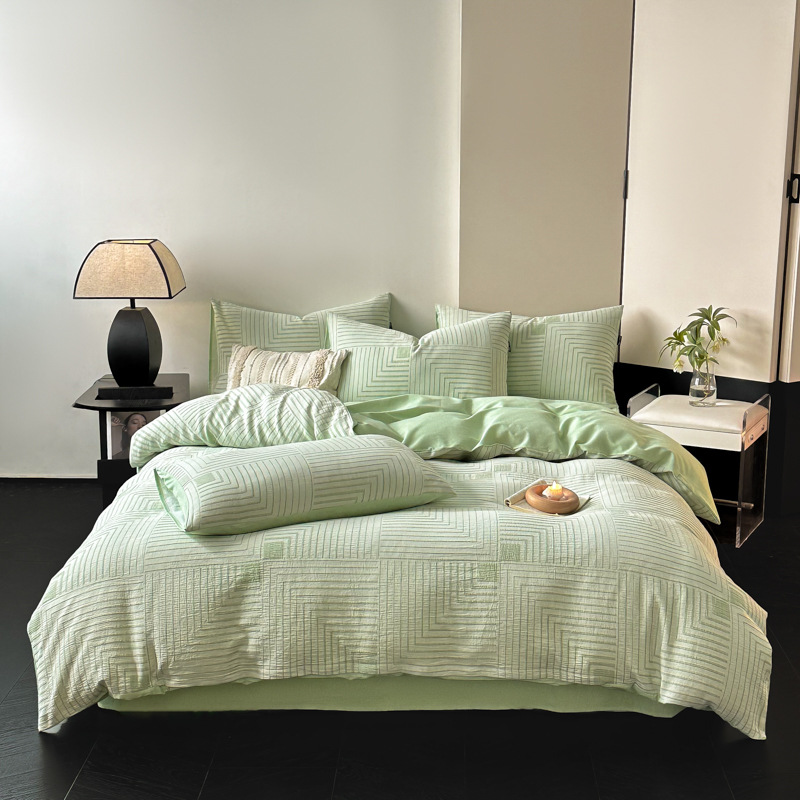 Una clase de madres y bebés de algodón molido cuatro piezas Nantong ropa de cama textil de algodón sábanas de cama cuatro piezas