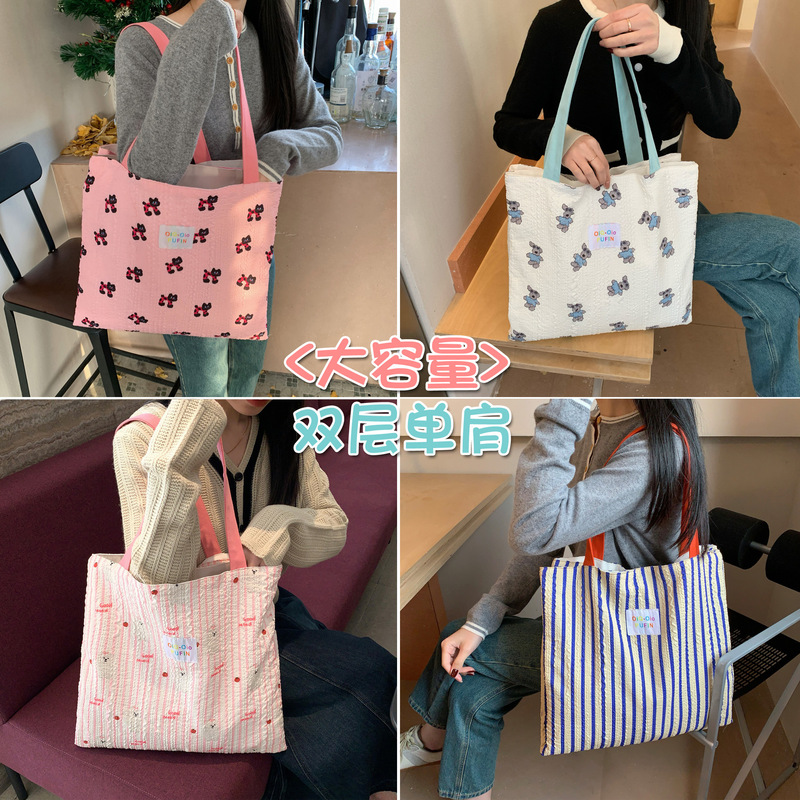 Striped foam double-layer shoulder bag 2024 Spring and Autumn new large capacity small trendy cat college style portable tote bag