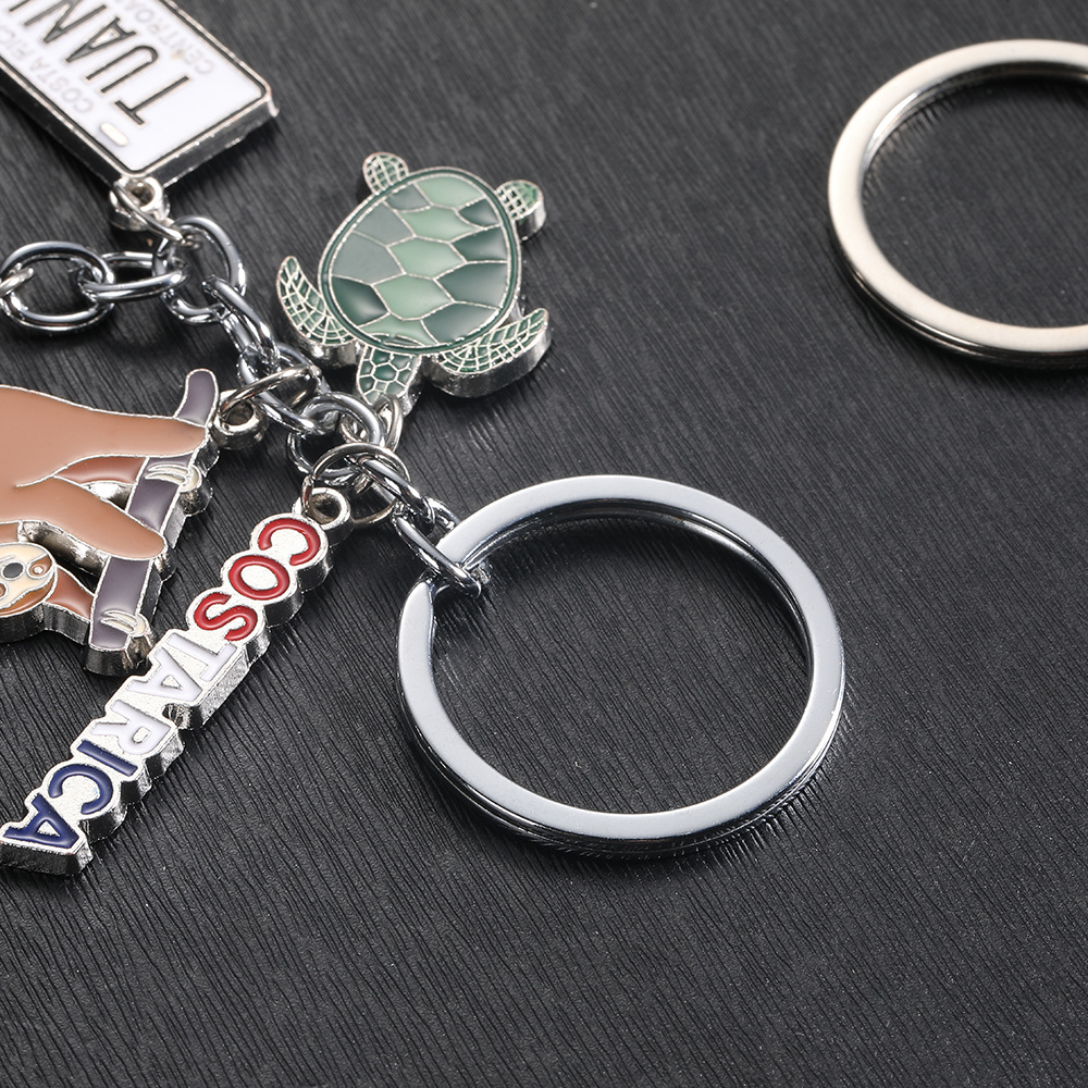 Fabricantes personalizados nuevos creativos árboles de arroz, letras de animales de moda personalidad llaveros colgantes de bolsas al por mayor