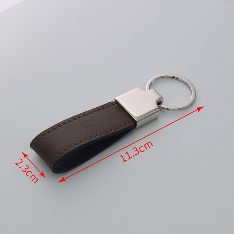 Transfronterizos en blanco spot embrión láser de cuero llavero de metal cuero colgante de automóvil personalizado regalos de negocios de alta calidad