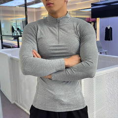 アメリカシームレスジャカード半ファスナー長袖弾力速乾運動丸襟レジャートレーニングガードルtシャツ男