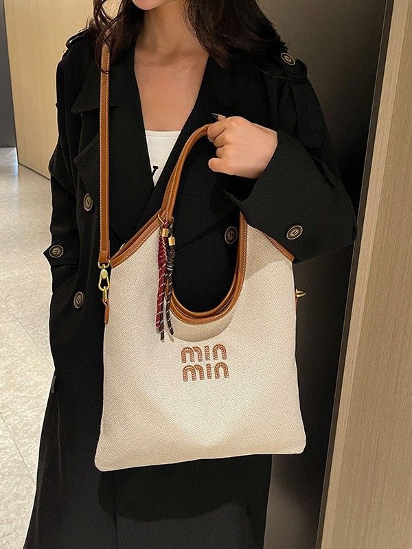 Bolsa de mano coreana retro de gran capacidad para mujeres 2024 otoño y invierno nuevo simple bolso de hombro casual de alta sensación bolso de brazo