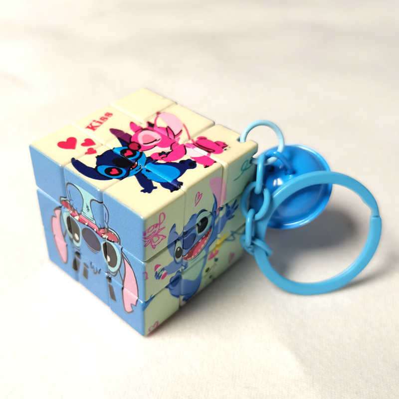 卵の子のパーティーの新型のミニの小さいルービックキューブのキーホルダーは義烏工場のメーカーの卸売りの子供機の子供を掛けます。