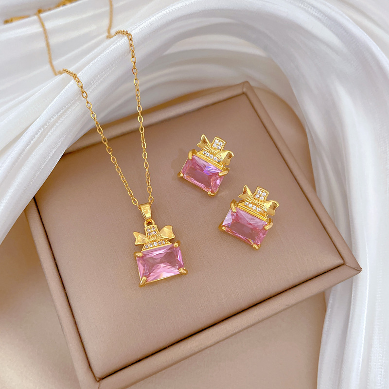 Set collana e orecchini a farfalla con boccetta di profumo_voghion.com