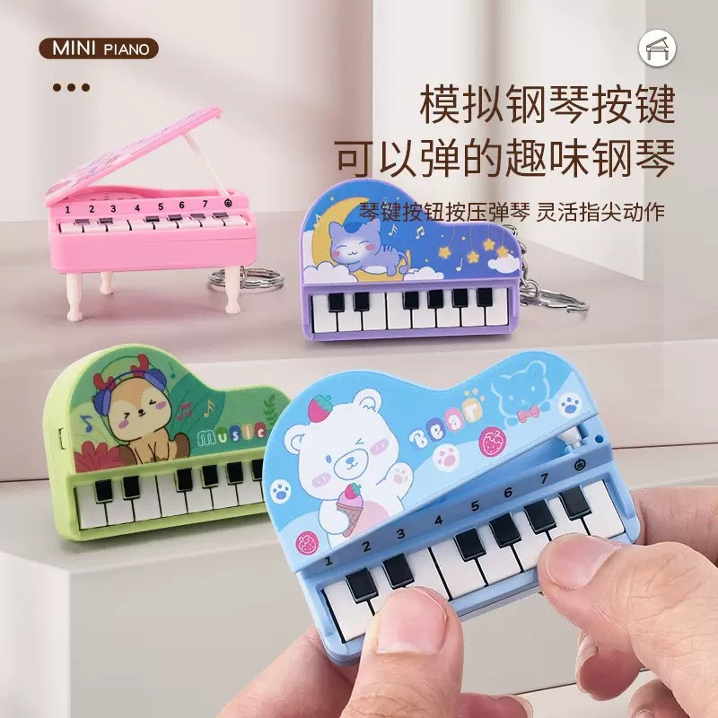 Transfronterizo portátil mini plegable piano de escritorio llavero colgante de simulación de teclas luminosas regalos musicales creativos
