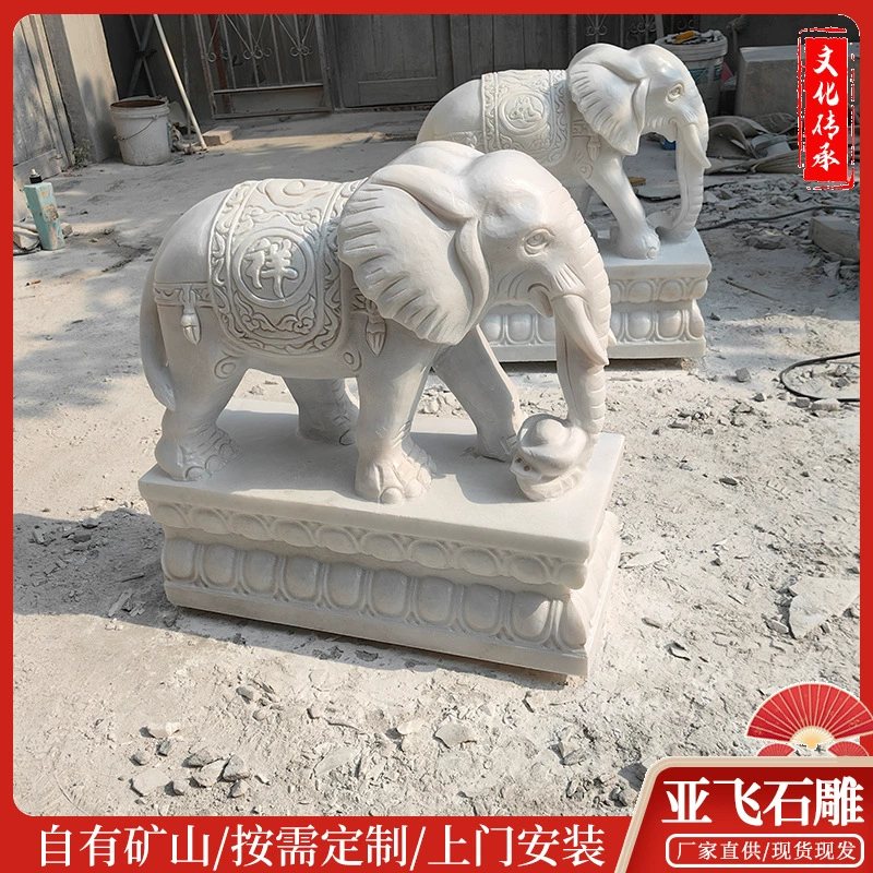 Белый мраморный каменный резной слон набирает удачу